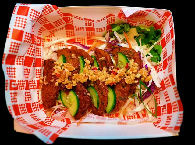 Two Sisters fishcake salad first-party photograph